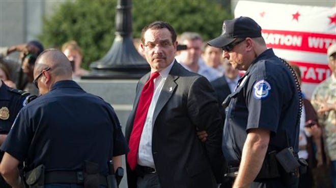 DC Mayor Vincent Gray arrested during budget protest.jpg